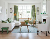 <p> For a contemporary take on classic country decorating ideas, make fresh and vibrant patterns the stars of the show. Combining a variety of prints, all in fresh greens and whites, ensures this room feels calm and not overwhelming.   </p> <p> Here, there is a wonderful mixture of patterned textiles, from the cushions and lampshade, to the curtains and rug underfoot. The clean white space and white pieces of furniture ensure all the green pattern doesn't dominate. Warm wood, brought in through the coffee table, console and flooring, bring in the essential natural element key to any country scheme.  </p>