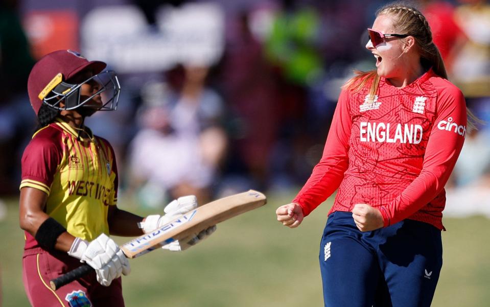 England's Sophie Ecclestone (R) celebrates after the dismissal of West Indies' Zaida James (L) during the Group B T20 women's World Cup cricket match between West Indies and England at Boland Park in Paarl on February 11, 2023 - MARCO LONGARI/Getty Images
