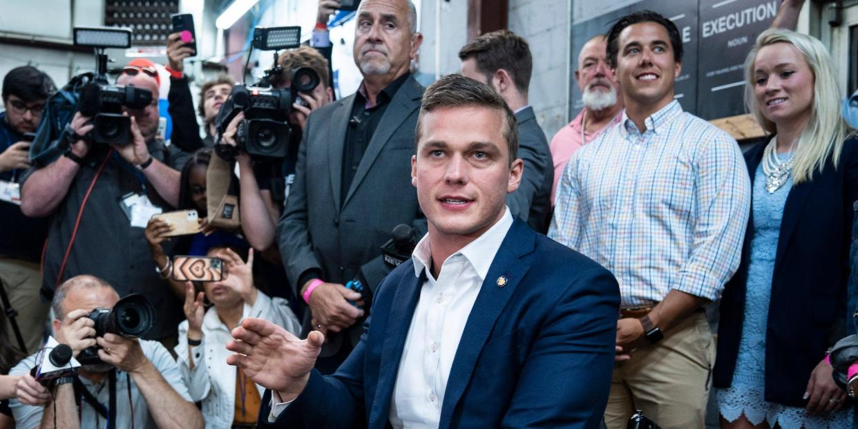 Republican Rep. Madison Cawthorn of North Carolina speaks to reporters at his campaign headquarters in Hendersonville, NC on May 17, 2022.