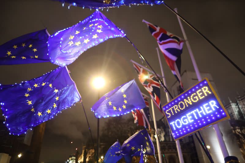 Anti-Brexit protesters demonstrate outside the Houses of Parliament in London