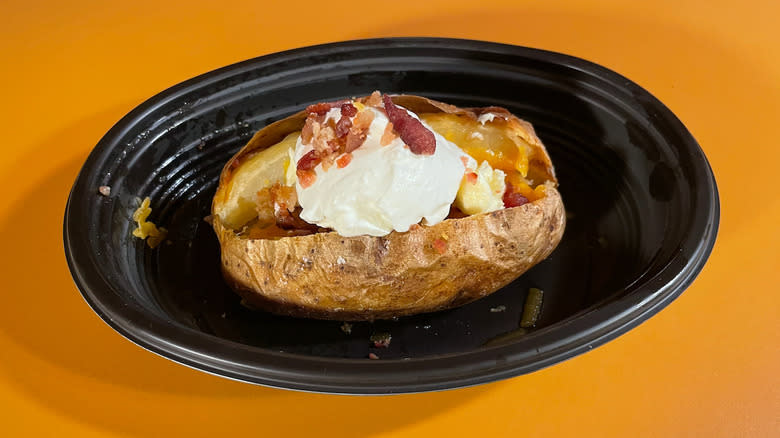 loaded baked potato on plate