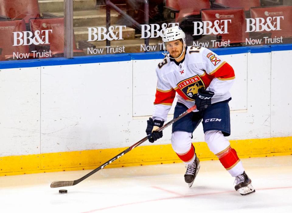 Florida Panthers center Vinnie Hinostroza (13) drives down the ice with the puck during the first period of the first training camp scrimmage in preparation for the 2021 NHL season at the BB&T Center on Thursday, January 7, 2021 in Sunrise.