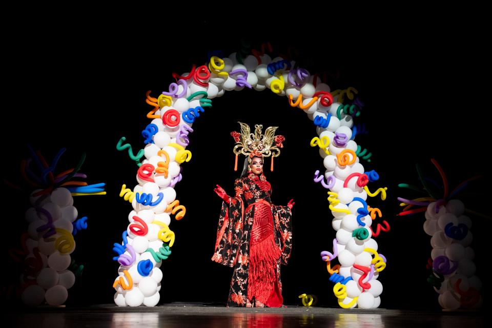 Jinesys Sinclaire walks out onto the stage to perform during Jackson Pride Fest in the Carl Perkins Civic Center on Saturday, October 8, 2022, in Jackson, Tenn.