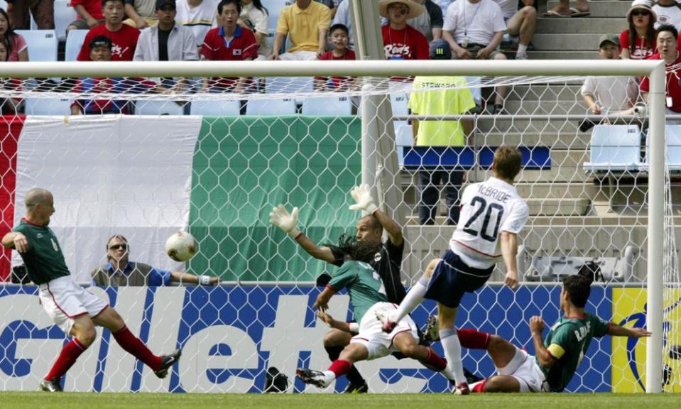 Brian McBride scoring the USA’s opener against Mexico in the second round of the 2002 World Cup Finals in Chonju, South Korea.