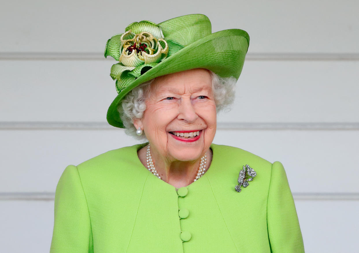 EGHAM, UNITED KINGDOM - JULY 11: (EMBARGOED FOR PUBLICATION IN UK NEWSPAPERS UNTIL 24 HOURS AFTER CREATE DATE AND TIME) Queen Elizabeth II (wearing her Vanguard Rose Brooch which she received in 1944 from Messrs John Brown and Co. when she launched HMS Vanguard) attends the Out-Sourcing Inc. Royal Windsor Cup polo match and a carriage driving display by the British Driving Society at Guards Polo Club, Smith's Lawn on July 11, 2021 in Egham, England. (Photo by Max Mumby/Indigo/Getty Images)