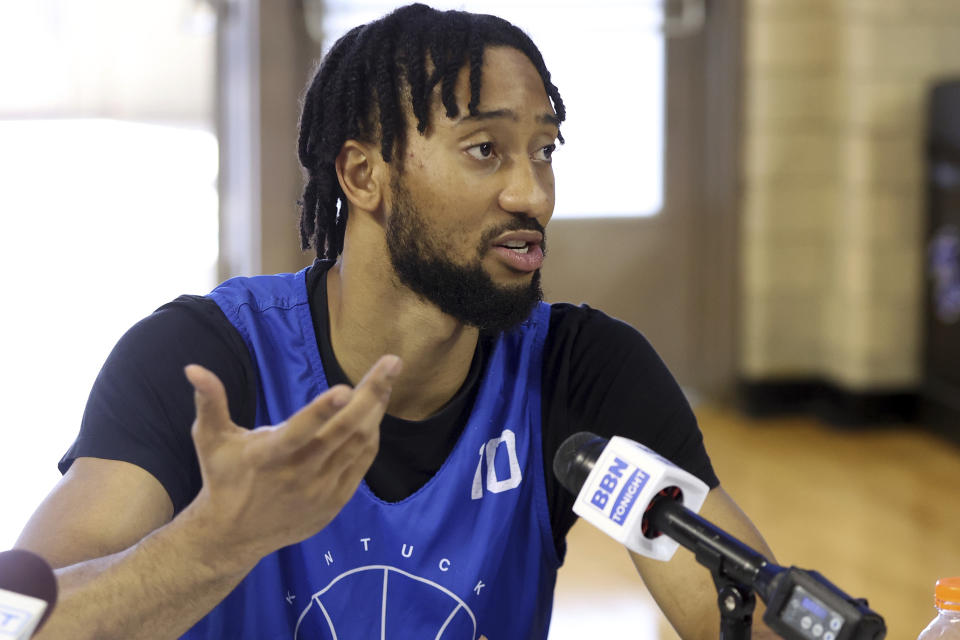 Kentucky's Davion Mintz makes a point during the school's NCAA college basketball media day in Lexington, Ky., Wednesday, Oct. 20, 2021. (AP Photo/James Crisp)