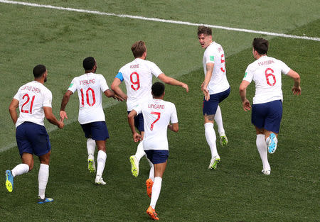 England's John Stones celebrates scoring their fourth goal with team mates. REUTERS/Ivan Alvarado