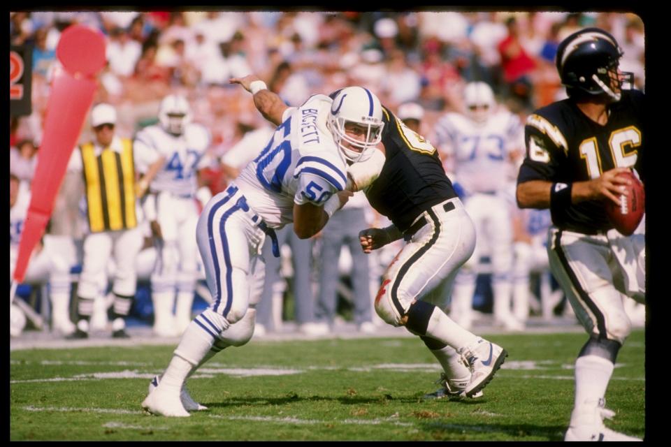 Linebacker Duane Bickett of the Indianapolis Colts (left) in action during a game against the San Diego Chargers at Jack Murphy Stadium in San Diego, California.