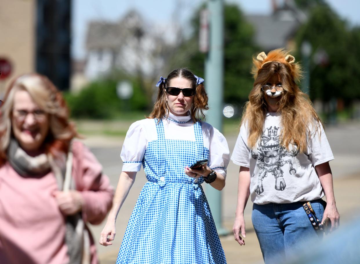 Dressed for the occasion, Michele Regula of Fresno and Tiffanie Howald of Jackson Township participate earlier this month in The Oz Escape Immersive Canton Experience, an online activity through Questo. The event was held in downtown Canton.