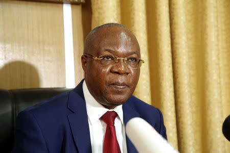 Congo's Attorney General Flory Numbi speaks to a member of the press during a news conference in Kinshasa, central Democratic Republic of Congo May 23, 2017. REUTERS/Kenny Katombe