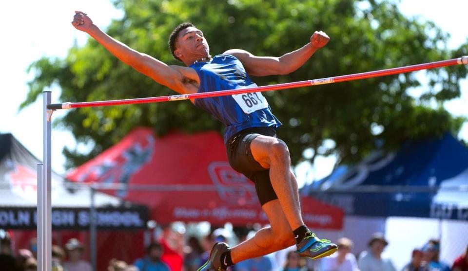 Federal Way’s Jaylon Jenkins jumps en route to the 3A boys high jump state title by clearing 6’ 8” during the opening day of the WIAA state track and field championships at Mount Tahoma High School in Tacoma, Washington, on Thursday, May 25, 2023.
