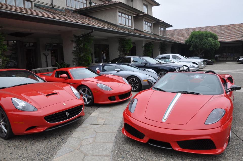Just your typical parking lot. The Inn at Spanish Bay wasn't even in the thick of the action, and the valet area still looks like this. "What do we do with the 16M? There's no room." "Just park it in front of that Carrera GT and the Veyron."