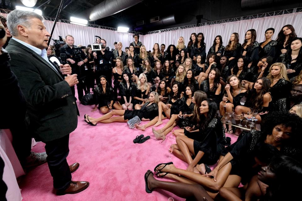 Ed Razek speaks to the models backstage during the 2018 Victoria's Secret Fashion Show on November 8, 2018