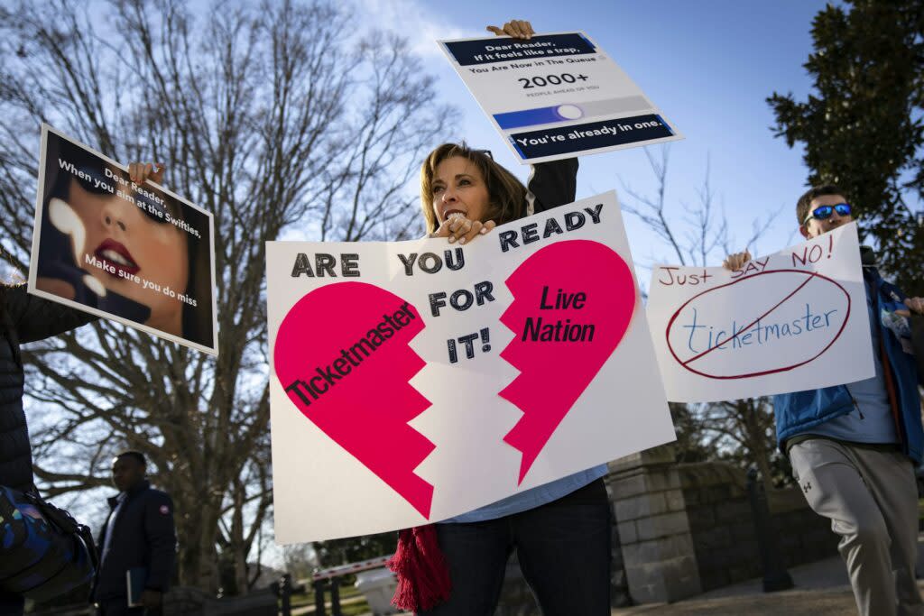 A woman protests against Live Nation and Ticketmaster outside the U.S. Capitol on Jan. 24, 2023.