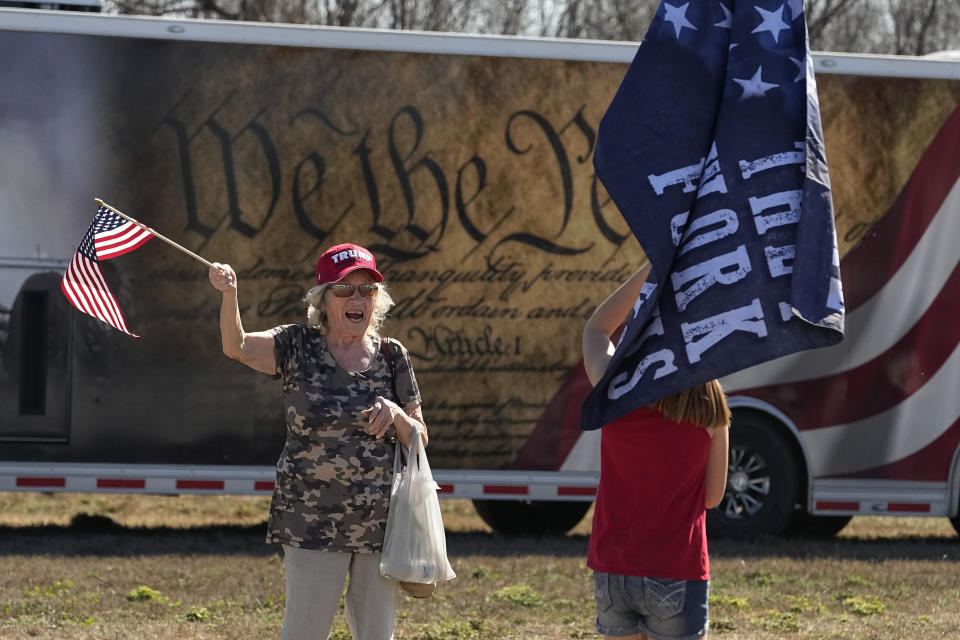 Dollie Richardson, 84, cheers during a "Take Our Border Back" convoy and rally, Saturday, Feb. 3, 2024, in Quemado, Texas. (AP Photo/Eric Gay)