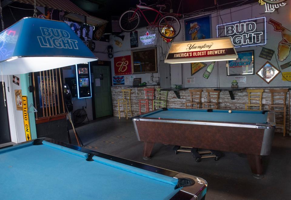 The Shack on West Nine Mile Road is a colorful watering hole that welcomes everyone in for a drink.