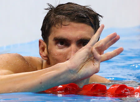 2016 Rio Olympics - Swimming - Final - Men's 200m Individual Medley Final - Olympic Aquatics Stadium - Rio de Janeiro, Brazil - 11/08/2016. Michael Phelps (USA) of USA celebrates REUTERS/David Gray