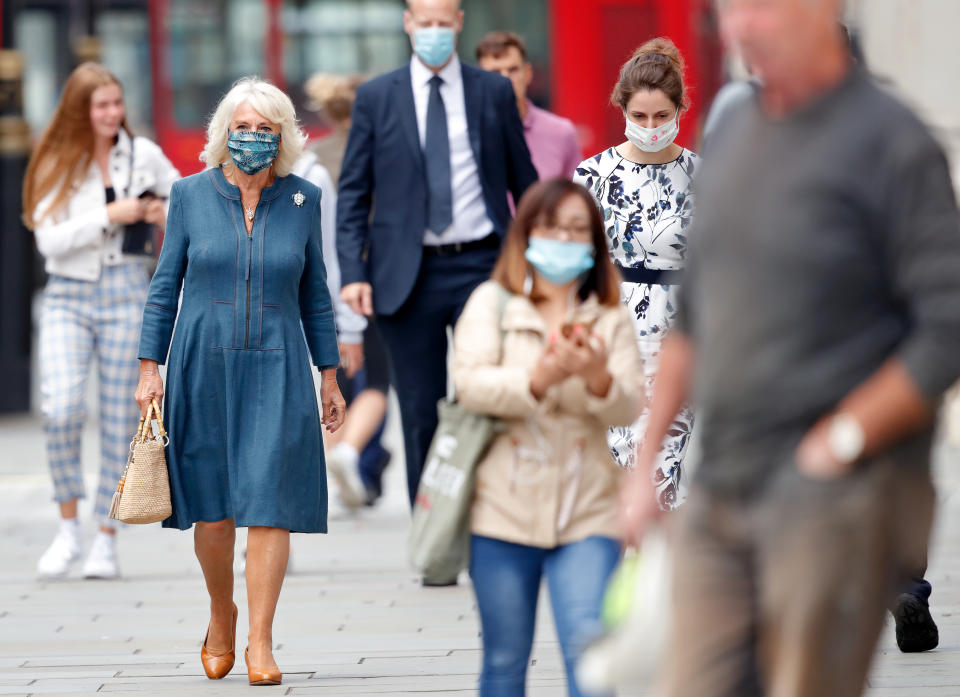 LONDON, UNITED KINGDOM - JULY 28: (EMBARGOED FOR PUBLICATION IN UK NEWSPAPERS UNTIL 24 HOURS AFTER CREATE DATE AND TIME) Camilla, Duchess of Cornwall (seen wearing a peacock feather patterned face mask) visits the recently reopened National Gallery to meet with staff involved in the organisation's Covid-19 response and reopening process on July 28, 2020 in London, England. The National Gallery, which was closed for 111 days due to the coronavirus pandemic, was the first major national art museum to reopen in the UK. (Photo by Max Mumby/Indigo/Getty Images)