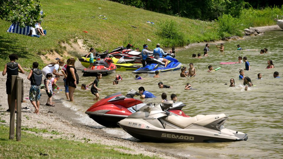 Personal watercraft hug the shoreline at Blue Marsh Lake near Reading, Pennsylvania. In that state, you need a Boating Safety Education Certificate in your possession to operate one. The US Coast Guard says you should wear torso-protecting life jackets while riding one. Also, don't jump wakes and don't drink alcohol before operating. - Ben Hasty/MediaNews Group/Reading Eagle/Getty Images