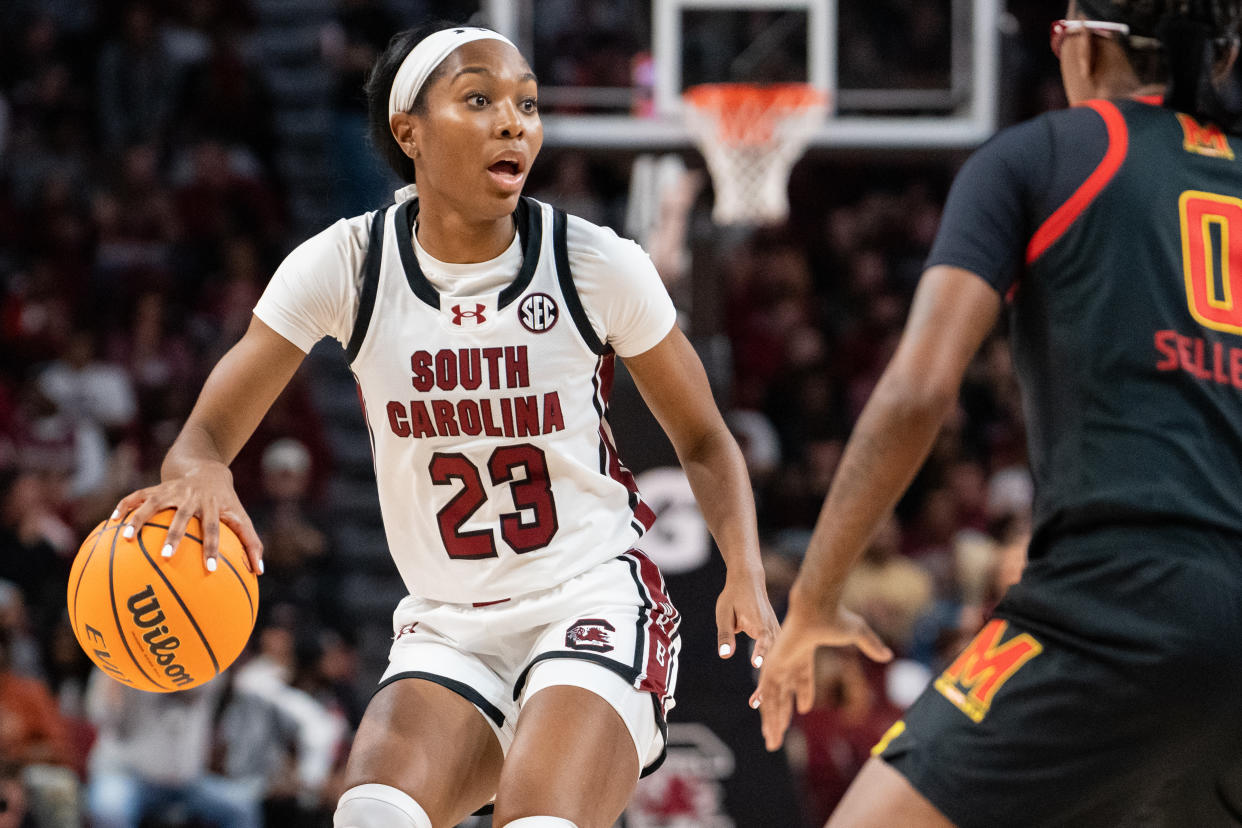 South Carolina's Bree Hall looks for a teammate while Maryland's Shyanne Sellers guards her in the third quarter during their game at Colonial Life Arena in Columbia, South Carolina, on Nov. 12, 2023. (Photo by Jacob Kupferman/Getty Images)