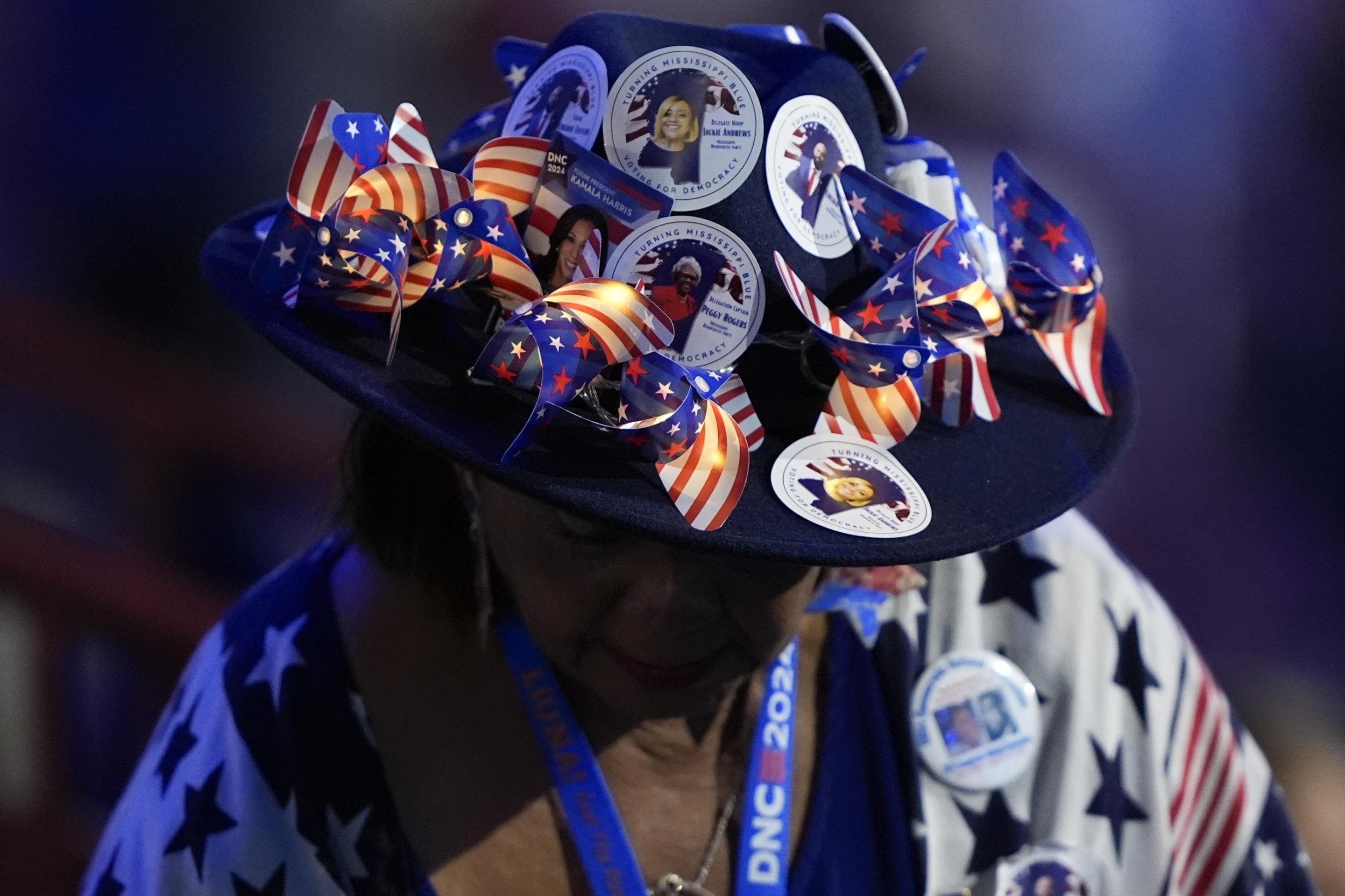 A member of the Mississippi delegation makes her way to her seat during the Democratic National Convention in Chicago Monday. (Charles Rex Arbogast/AP)