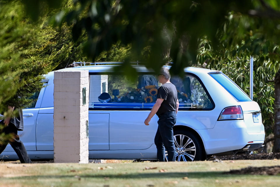 The hearse carrying the coffin of Zane Mellor is seen after his funeral at the Mersey Gardens Chapel and Crematorium in Devonport.