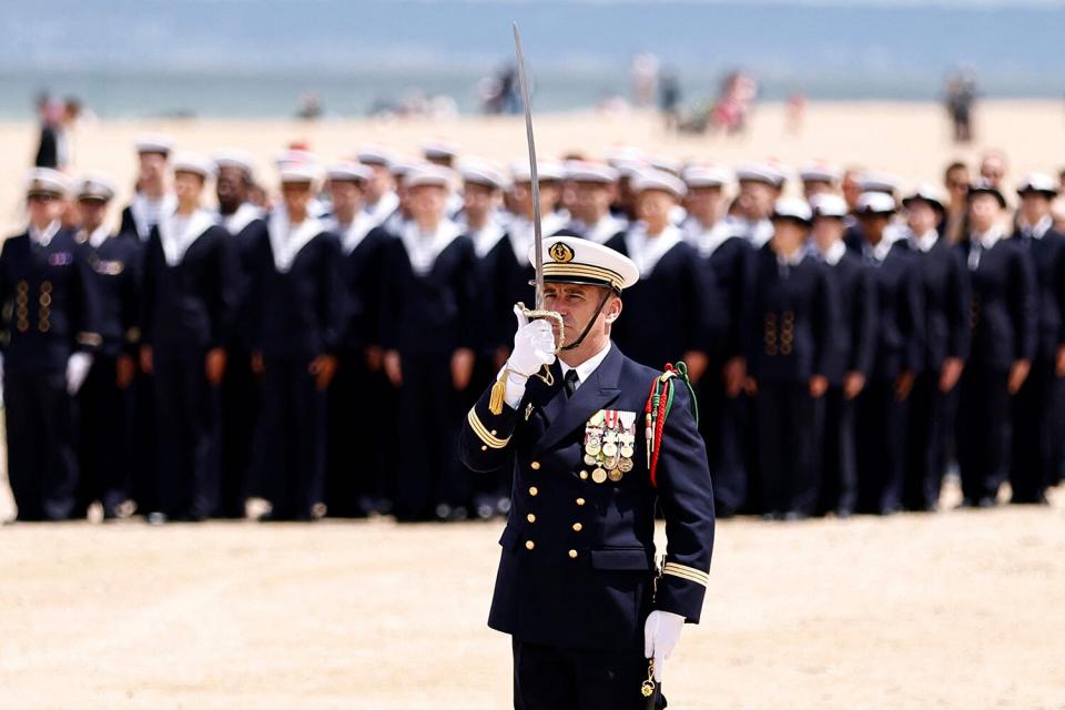 A military officer takes part in a ceremony marking the 78th anniversary since Allied forces landed in Normandy on "D-Day" during World War II in Ouistreham, on June 6, 2022.