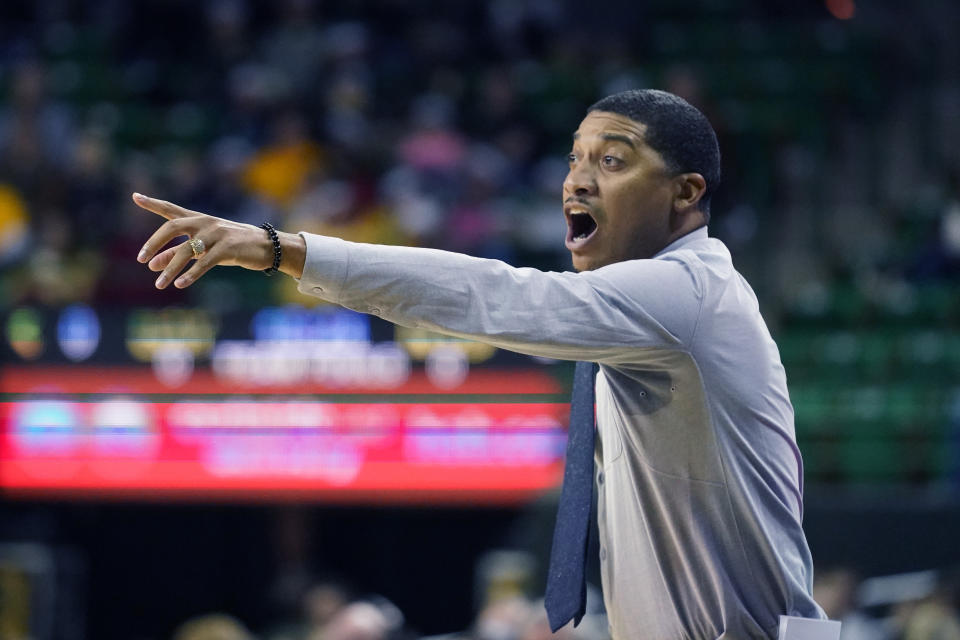 Northwestern State head coach Corey Gipson yells from the sidelines during the first half of an NCAA college basketball game against Baylor in Waco, Texas, Tuesday, Dec. 20, 2022. (AP Photo/LM Otero)