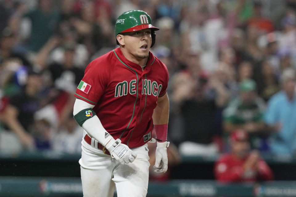Mexico's Luis Urias (3) reacts after he singled to right field during the seventh inning of a World Baseball Classic game against Puerto Rico, Friday, March 17, 2023, in Miami. Alex Verdugo scored on the hit to take lead against Puerto Rico. Mexico defeated Puerto Rico 5-4. (AP Photo/Marta Lavandier)