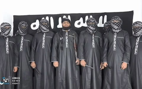 A group of men claiming to be the the Sri Lanka bomb attackers appear in an Isil propaganda video