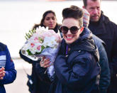 <p>Which is more gorgeous: Natalie Portman’s smile or the bouquet of flowers she’s carrying? The actress received the arrangement on Monday the set of her new film <em>Vox Lux, </em>currently in production at Plumb Beach in Brooklyn, New York. (Photo: James Devaney/GC Images) </p>