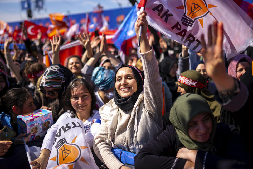 Justice and Development Party, or AKP, supporters chant slogans during a campaign rally ahead of nationwide municipality elections, in Istanbul, Turkey, Sunday, March 24, 2024. On Sunday, millions of voters in Turkey head to the polls to elect mayors and administrators in local elections which will gauge President Recep Tayyip Erdogan’s popularity as his ruling party tries to win back key cities it lost five years ago. (AP Photo/Francisco Seco)