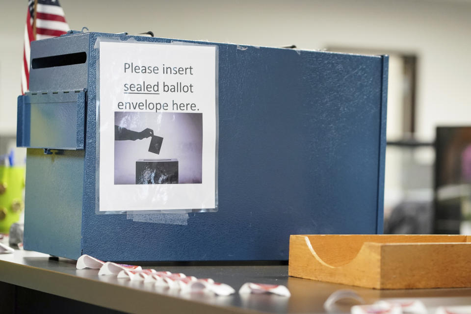 This Saturday, March 14, 2020 file photo, shows a view of a ballot box on a counter prepared for early voting at the Warren County Board of Elections, in Lebanon, Ohio. Ohio and Republican groups including the Trump campaign are defending a GOP election chief's directive limiting ballot drop boxes in the critical presidential battleground to one per county. (AP Photo/Aaron Doster, File)