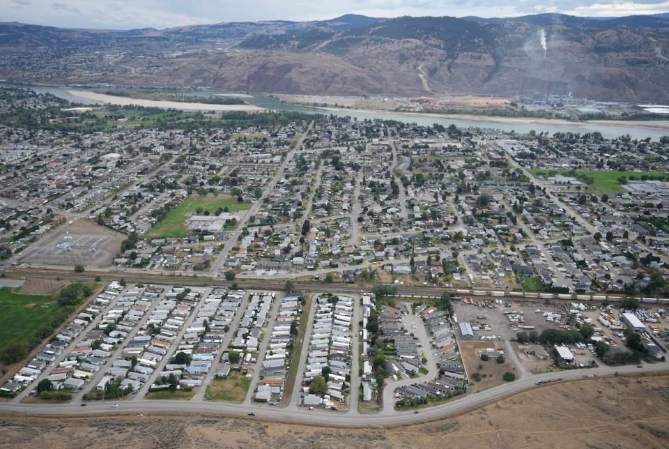 Houses and mobile homes are seen in an aerial view in a residential neighbourhood in Kamloops, B.C. on Sept. 11, 2023.