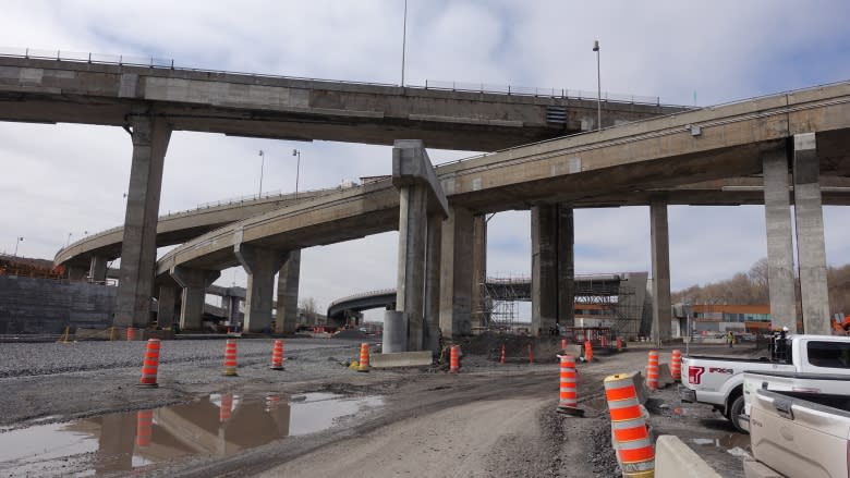 Bulldozers and cranes for 50th birthday of Turcot Interchange