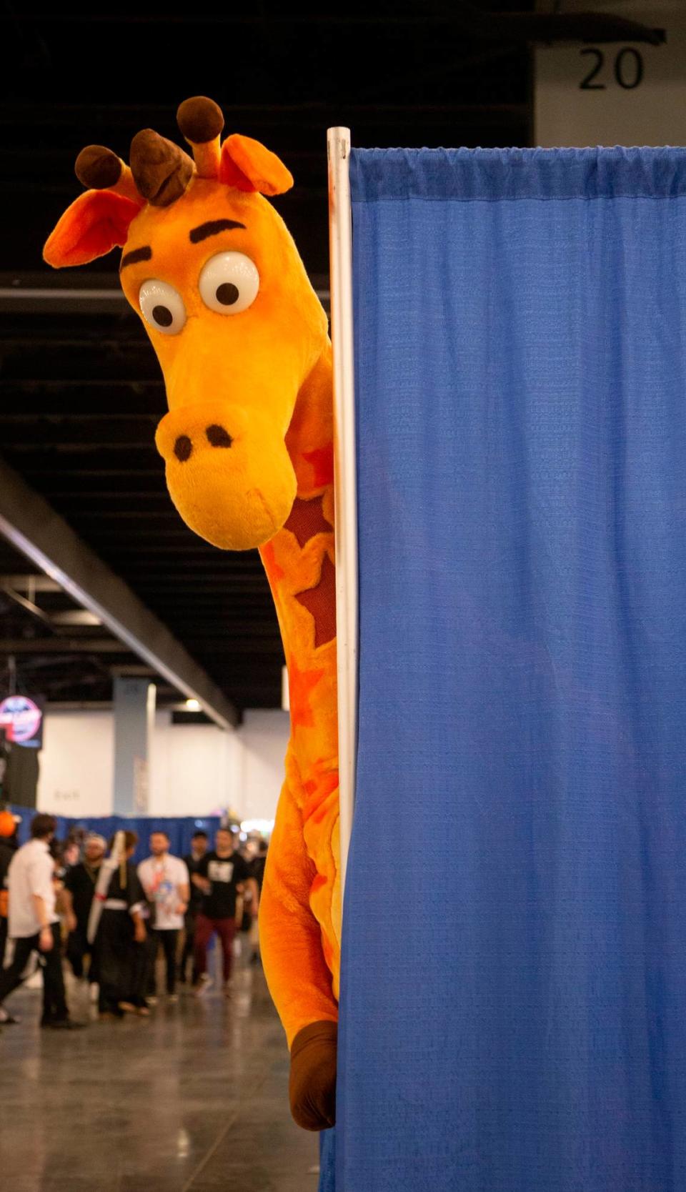 Kenneth Wojciechowski cosplays as Geoffrey the Giraffe, the Toys “R” Us mascot, during Florida Supercon 2023 at the Miami Beach Convention Center on Friday, June 30, 2023 in Miami Beach, Florida.