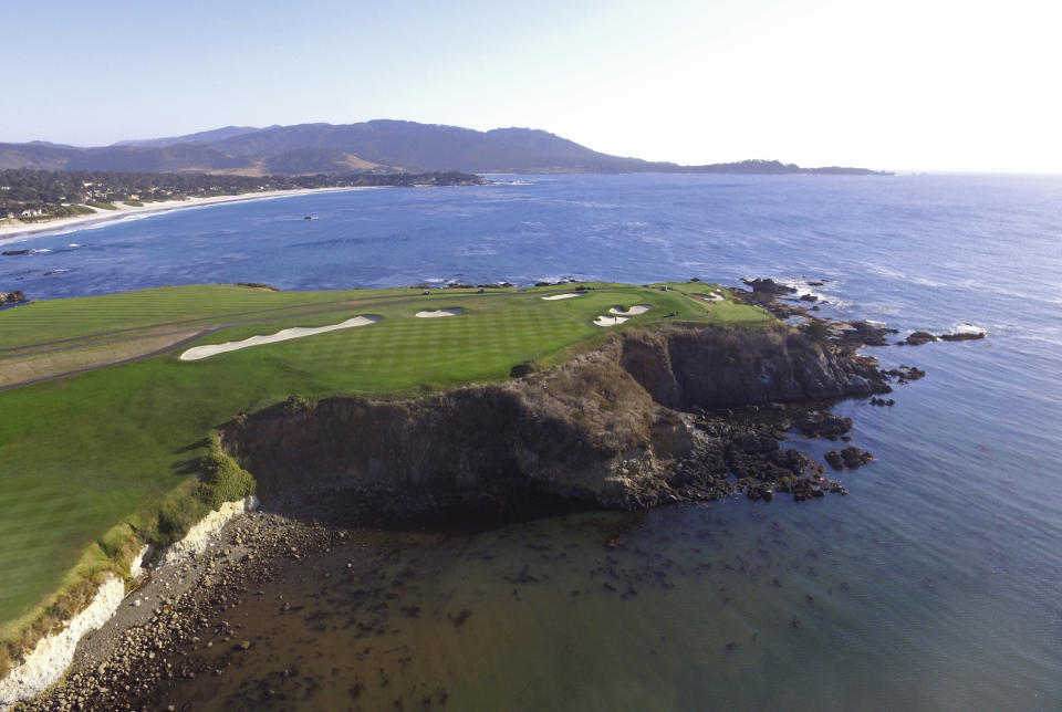 This Nov. 8, 2018 photo shows an aerial view of the sixth and seventh holes of the Pebble Beach Golf Links in Pebble Beach, Calif. The U.S. Open golf tournament is scheduled at Pebble Beach from June 13-16, 2019. (AP Photo/Terry Chea)