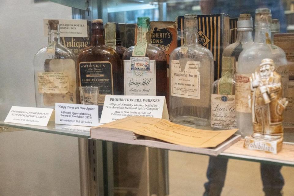 Prohibition-era whiskey bottles sit on a shelf at the Museum of Medical History in East Sacramento on Thursday, July 25, 2024. Dr. John Vallee, a retired OB-GYN who gives tours of the museum, said doctors during that time sometimes prescribed patients alcohol.