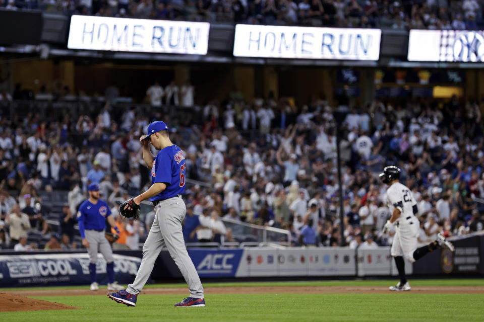 Chicago Cubs pitcher Matt Swarmer (67) reacts after giving up a home run to New York Yankees' Giancarlo Stanton during the fourth inning of a baseball game Saturday, June 11, 2022, in New York. (AP Photo/Adam Hunger)