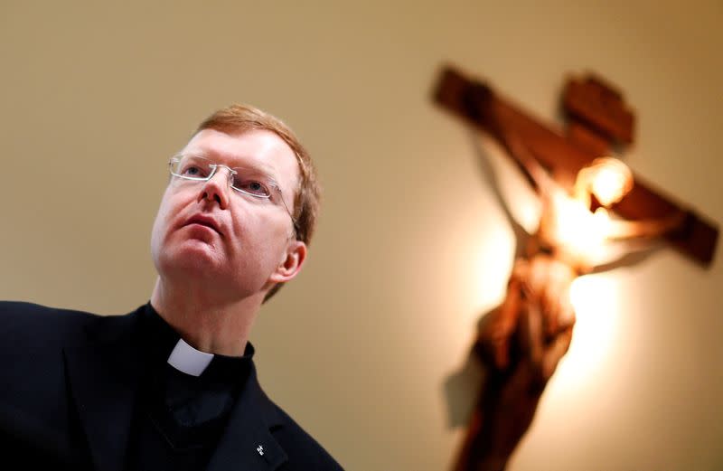 FILE PHOTO: Father Hans Zollner, the Vatican's Chair of the Steering Committee of the Centre for the Protection of Minors, looks on as he attends a news conference at the Pontificial Gregorian University in Rome