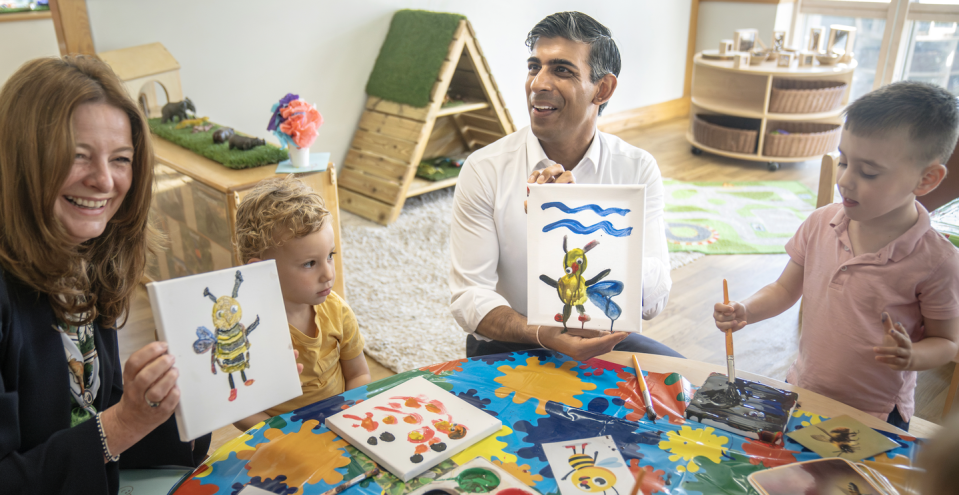 rishi sunak with kids at a nursery