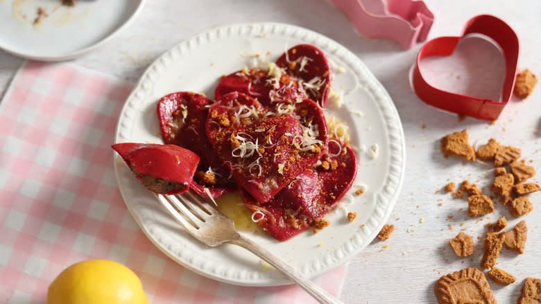 beet ravioli with metal fork