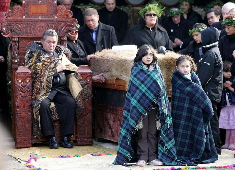 File: Maori King Tuheitia sits on the carved wooden throne in 2006 (POOL/AFP via Getty Images)