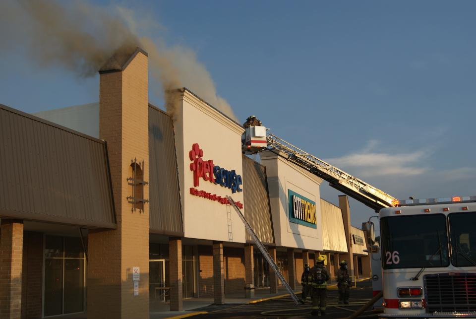 Thibodaux firefighters contain the fire Thursday evening at Petsense, 357-A North Canal Blvd.