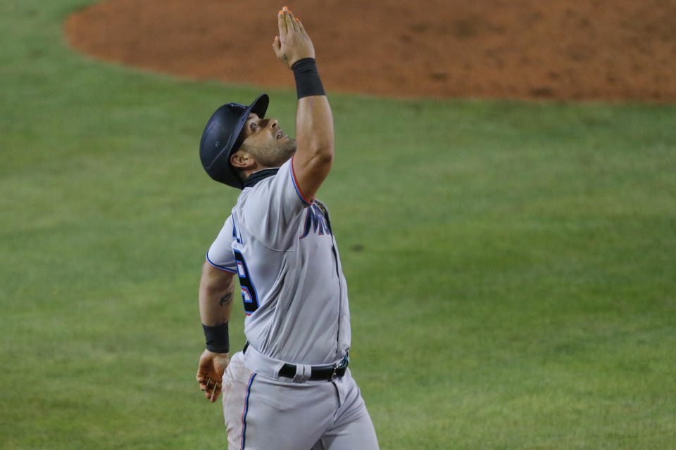 Miami Marlins' Francisco Cervelli celebrates his three-run home run against the Toronto Blue Jays during the ninth inning of a baseball game Tuesday, Aug. 11, 2020, in Buffalo, N.Y. (AP Photo/Jeffrey T. Barnes)