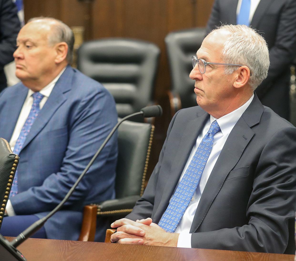 Former FirstEnergy CEO Charles "Chuck" Jones, left, and former FirstEnergy Senior VP of External Affairs Michael Dowling are accused of participating in a pay-to-play scheme. Dowling wants to call Gov. Mike DeWine and Lt. Gov. Jon Husted as witnesses.