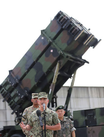 U.S. Pacific Command Commander Adm. Harry Harris Jr. answers a reporter's question during a press conference at Osan Air Base in Pyeongtaek, South Korea August 22, 2017. REUTERS/Pool