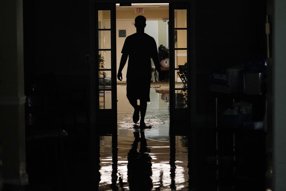 Flooding at the Peach Tree Village nursing home in Brandon, Miss., after a morning of torrential rains on Wednesday.  (Rogelio V. Solis / AP)