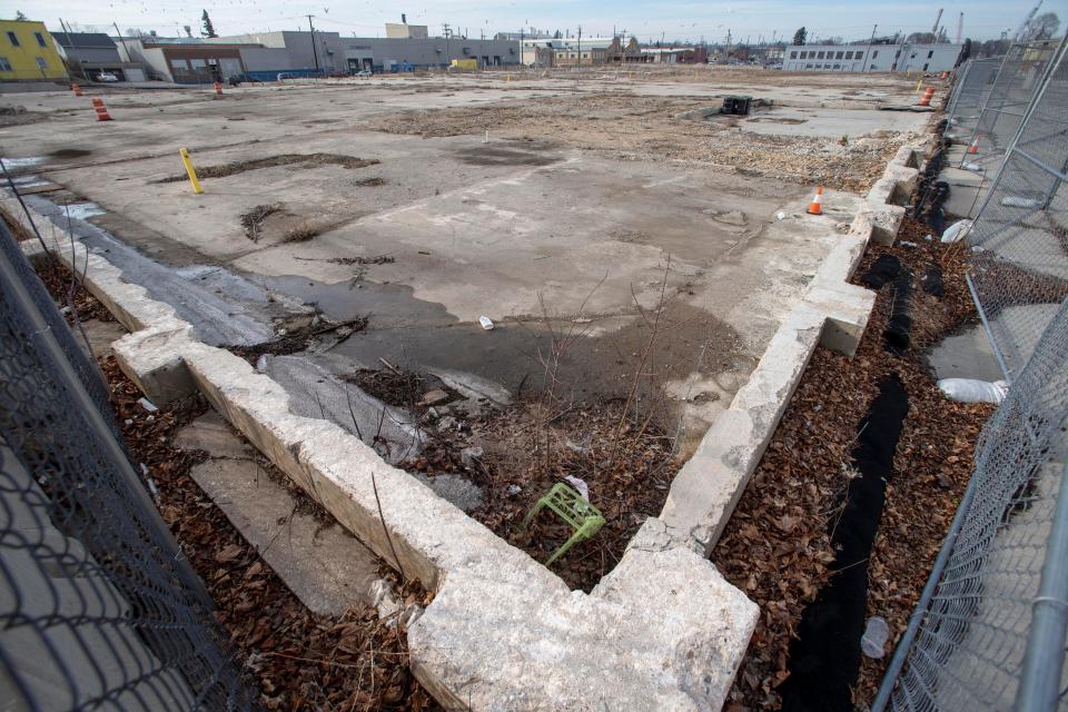 A corner of the old Mirro plant wall is all that seems to remain at the fenced-in property, Thursday, March 17, 2022, in Manitowoc, Wis.