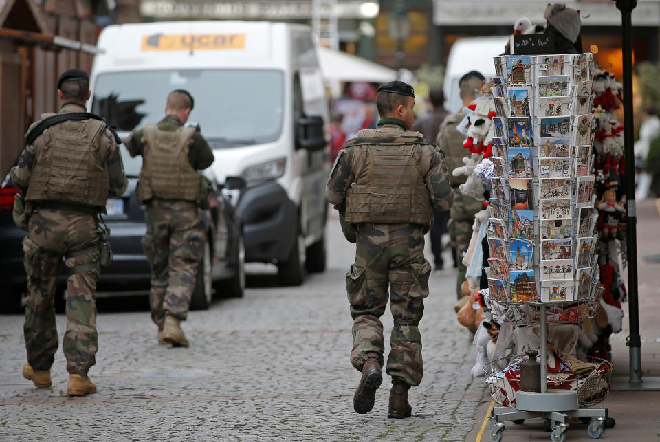 French soldiers patrol the street near Strasbourg's cathedral in Strasbourg, France, November 21, 2016. France said on Monday it had foiled a terrorist plot and arrested seven people, a year after a state of emergency was imposed to counter a wave of Islamist attacks. REUTERS/Vincent Kessler